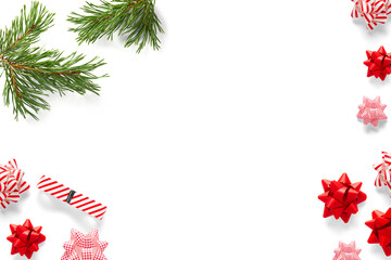 Obraz premium Christmas composition. Christmas gift, knitted blanket, pine cones, fir branches on white background. Flat lay, top view, copy space
