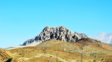 Landscape view of mountain under blue sky. Muscat, Oman 