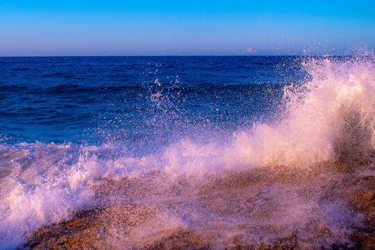 Wave smashing on rocks.