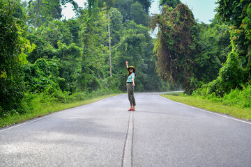A lonely girl on the road.