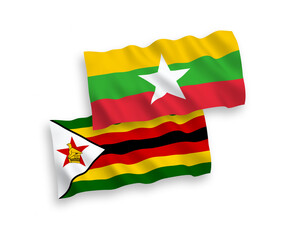 Flags of Zimbabwe and Myanmar on a white background