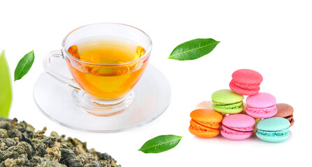 cup of hot tea set with macaroons