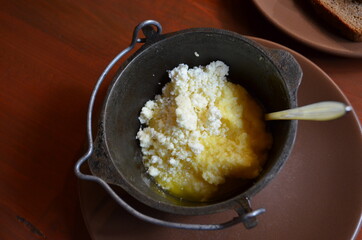 Hutsul banosh with cheese in a bowl