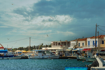 Elafonisos port in Greece aqgainst a dramatic sky. Famous touristic destination.
