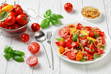 tomato salad with fried onion, quinoa and basil