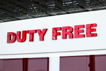 Duty free sign in the airport building. The tax-free area symbol