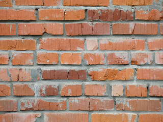 brick red wall of the barn for a brutal background in the loft