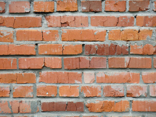 brick red wall of the barn for a brutal background in the loft