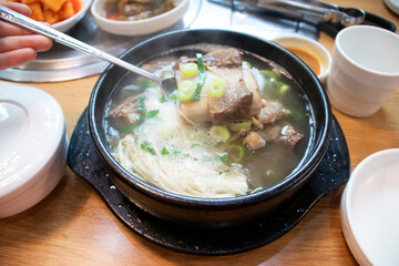 Delicious Short Rib Soup in a bowl. Korean style beef rips soup.