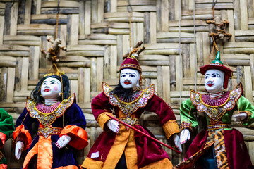 Traditional handicraft puppets are sold in a market at Mandalay, Myanmar.
