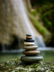 Balanced Zen stones at the waterfalls