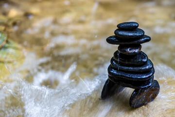 Balanced Zen stones at the waterfalls