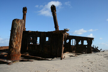 Old rusty shipwreck on Fraser Island East Coast, Queensland, Australia