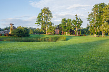 City Talsi, Latvia. Old red brick house and park.