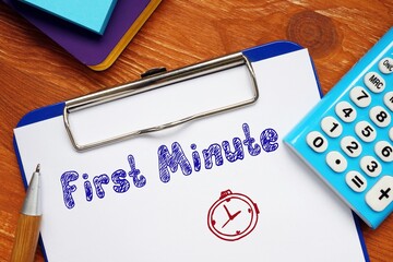 Business concept about First Minute with phrase on the piece of paper.