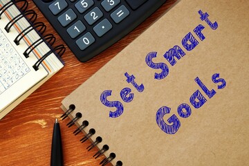 Business concept about Set Smart Goals with phrase on the sheet.