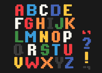 Alphabet letters from colorful plastic toy blocks isolated to solid background