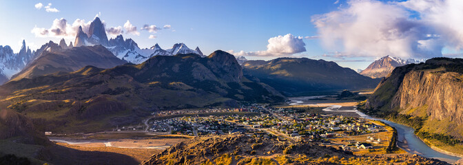 Panoramic view at dawn on the village of el chalten and the Patagonian mountains of Cerro Torre and Fitz Roy. Border between Chile and Argentina
