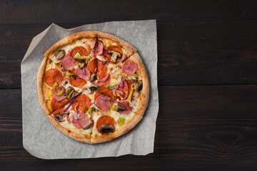 Closeup of freshly baked pizza in restaurant.
