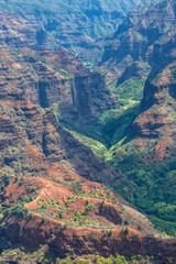 Naklejka premium Hawaii, Napali Coast with his blue water, blue sky and raw contrast