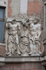 Bas-relief ,relief (sculpture)  from Satu Mare to old buildings in the city center Romania, January, 2020
