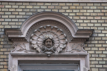 Bas-relief ,relief (sculpture)  from Satu Mare to old buildings in the city center Romania, January, 2020