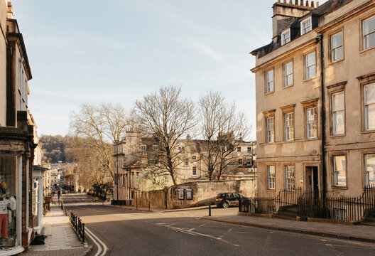 Sunny buildings and empty street, Bath, Somerset, UK
