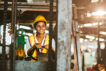 American black women labor worker at forklift driver happy working in industry factory logistic...