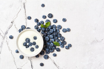 Healthy breakfast - white yogurt with blueberry berries