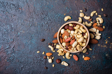 Bowl with nuts mix as snack or ingredient for tasty dessert, meal