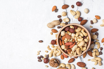 Bowl with nuts mix as snack or ingredient for tasty dessert, meal