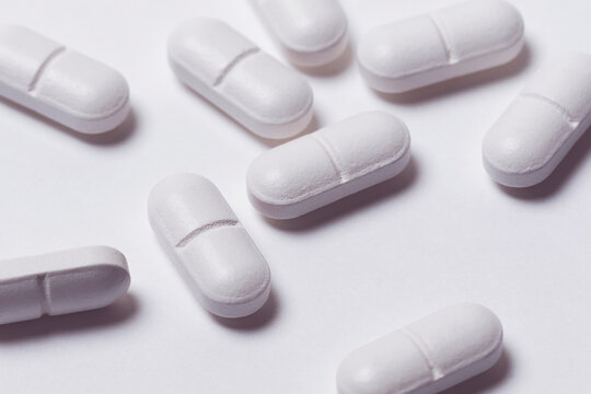 Prescription pills on white background
