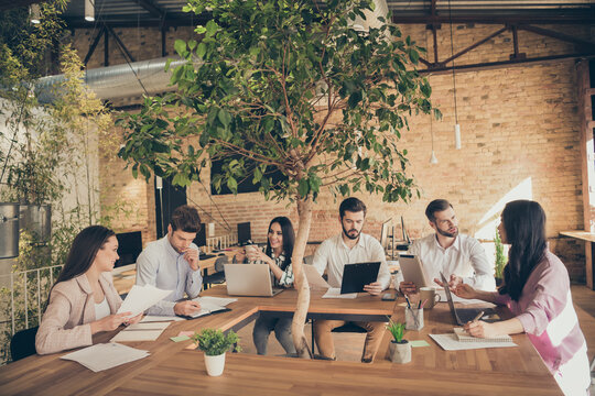 Nice attractive confident people economist leaders partners discussing it project start-up committee developing at modern industrial loft brick style interior workplace workstation