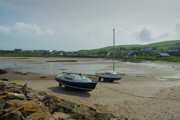 Fototapeta premium Boats on the beach at Port Logan, Scotland