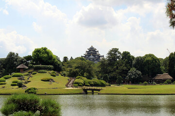 Reflection of Okayama Korakuen Garden and the Castle as background.