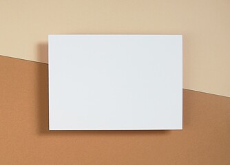 Horizontal empty card mockup, for invitation, thank you card, greeting card design, blank paper on brown background, flatly, top view.