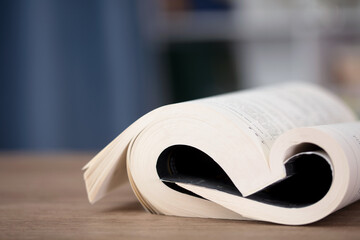 The opened book is on the table