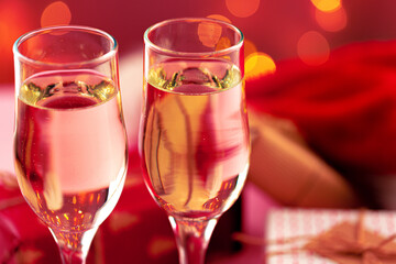 Close up photo of Champagne glasses against bokeh background