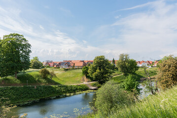 Fototapeta na wymiar the moat and green landscape at the fortifications in Fredericia