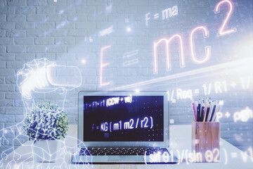 Desktop computer background and formula hologram writing. Double exposure. Education concept.
