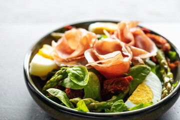salad with dried ham and egg