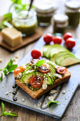 bruschetta with tomato and basil and avocado