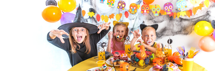 Cute little children with table with sweets. Banner