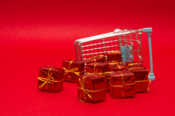 Cart, Chrismas, gifts red background. Space text. Happy New Year