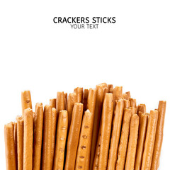 Creative layout made of crackers sticks on the white background. Food concept. Edible snack dry...