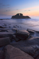 sunset on the rocky beach