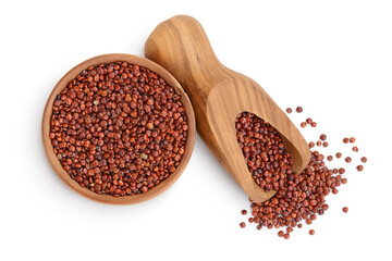 red quinoa seeds in wooden bowl and scoop isolated on white background with clipping path and full depth of field. Top view. Flat lay