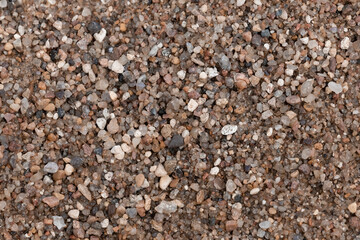 Close up of stones river sand.