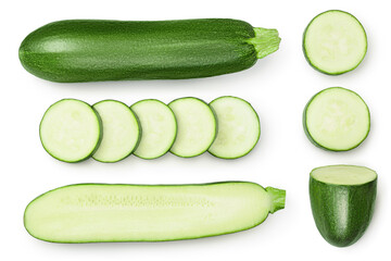 Fresh whole and sliced zucchini isolated on white background with clipping path and full depth of field. Top view. Flat lay