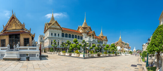 Chakri Maha Prasart Throne Hall, one of the most important and beautiful hall in The Grand Palace in Bangkok, Thailand, under summer blue sky